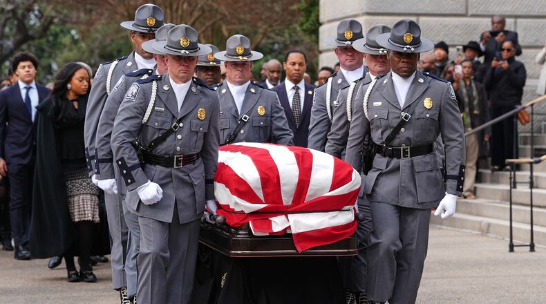 The casket of the Rev. Jesse Jackson is carried to the South Carolina Statehouse, where he will lie in state, Monday, March 2, 2026, in Columbia, S.C. (AP Photo/Matt Kelley, Pool)