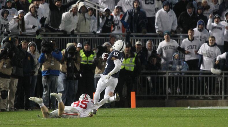 Ohio State’s Cameron Johnston tries to tackle Penn State’s Grant Haley on his return of a blocked field goal on Saturday, Oct. 22, 2016, at Beaver Stadium in State College, Pa. Haley scored the go-ahead touchdown. David Jablonski/Staff