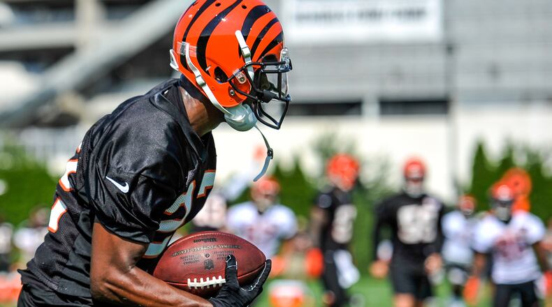 Cornerback William Jackson intercepts a pass intended for Cody Core during the first day of Cincinnati Bengals Training Camp Friday, July 28 at the practice fields beside Paul Brown Stadium in Cincinnati. NICK GRAHAM/STAFF