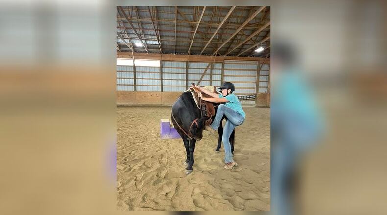 Casey Beach and her horse Clea prepare for a ride. Casey will compete at the Clark County Fair with Clea as a second year member of the Star Rider 4-H Club. Contributed