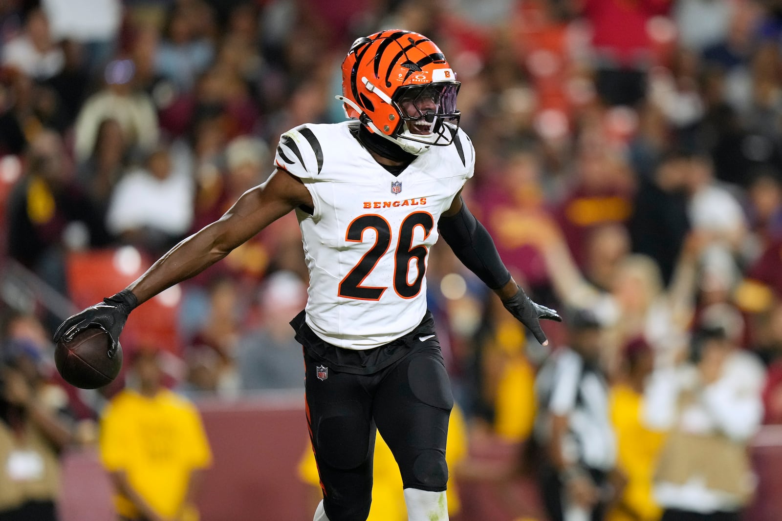 Cincinnati Bengals safety Tycen Anderson celebrates after intercepting a pass during the first half of a preseason NFL football game against the Washington Commanders Monday, Aug. 18, 2025, in Landover, Md. (AP Photo/Stephanie Scarbrough)