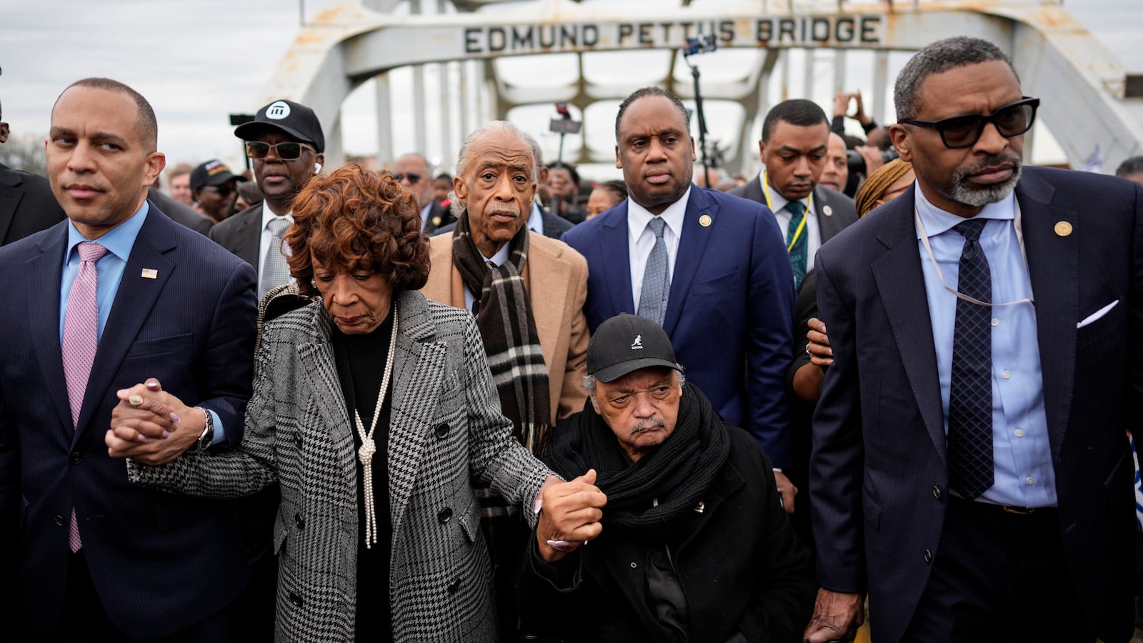 U.S. Rep. Hakeem Jeffries, D-NY, U.S. Rep. Maxine Waters, D-Calif., Rev. Al Sharpton, Rev. Jesse Jackson and NAACP President Derick Johnson, from left, march across the Edmund Pettus bridge during the 60th anniversary of the march to ensure that African Americans could exercise their constitutional right to vote, Sunday, March 9, 2025, in Selma, Ala. (AP Photo/Mike Stewart)