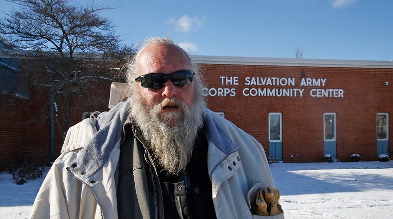 Harold Denney, who has been living under the Fountain Avenue Bridge, is taking advantage of the Extreme Cold Weather Homeless Shelter Tuesday, Jan. 16, 2024 in the Springfield Salvation Army gymnasium. The City of Springfield is partnering with the Nehemiah Foundation Faith Community Crisis Response Team, the Salvation Army, Sheltered Inc. and Homefull and has opened an Extreme Cold Weather Homeless Shelter to help those living on the street escape the bitter cold. BILL LACKEY/STAFF
