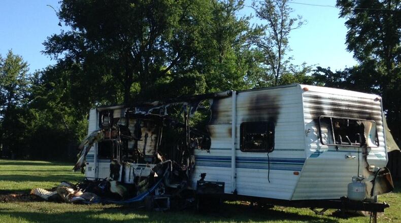 When this camper caught fire at the Greene County fairgrounds, officials believe it caused the power outage. GABRIELLE ENRIGHT/STAFF