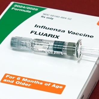 FILE: A flu vaccine is displayed at a pharmacy in New York, on Tuesday, Sept. 24, 2024. (AP Photo/Mary Conlon, File)