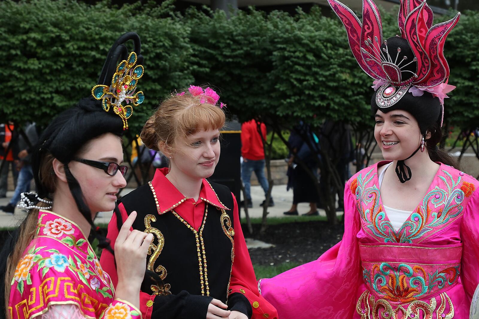 Wittenberg University Chinese studies students, from left, Kristin Irlam, Annemarie Brier and Megan Winters were wearing Chinese costumes at CultureFest Saturday. BILL LACKEY/STAFF