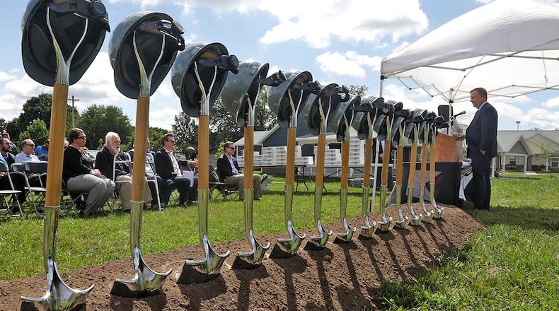 Ian Maute, from Buckeye Community Hope Foundation, speaks during the groundbreaking celebration for the next phase of The Community Gardens Tuesday, Sept. 13, 2022 in Springfield. BILL LACKEY/STAFF
