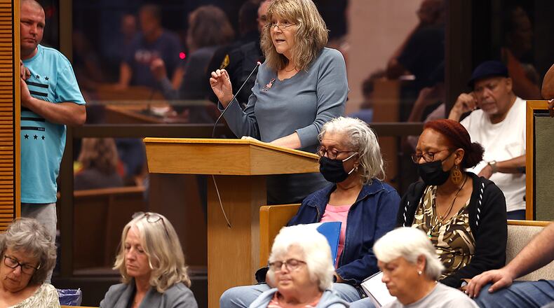 Debra Simon addresses the Springfield City Commission about her concerns regarding an influx of Haitian immigrants in the city during Tuesday's commission meeting, Sept. 12, 2023. BILL LACKEY/STAFF