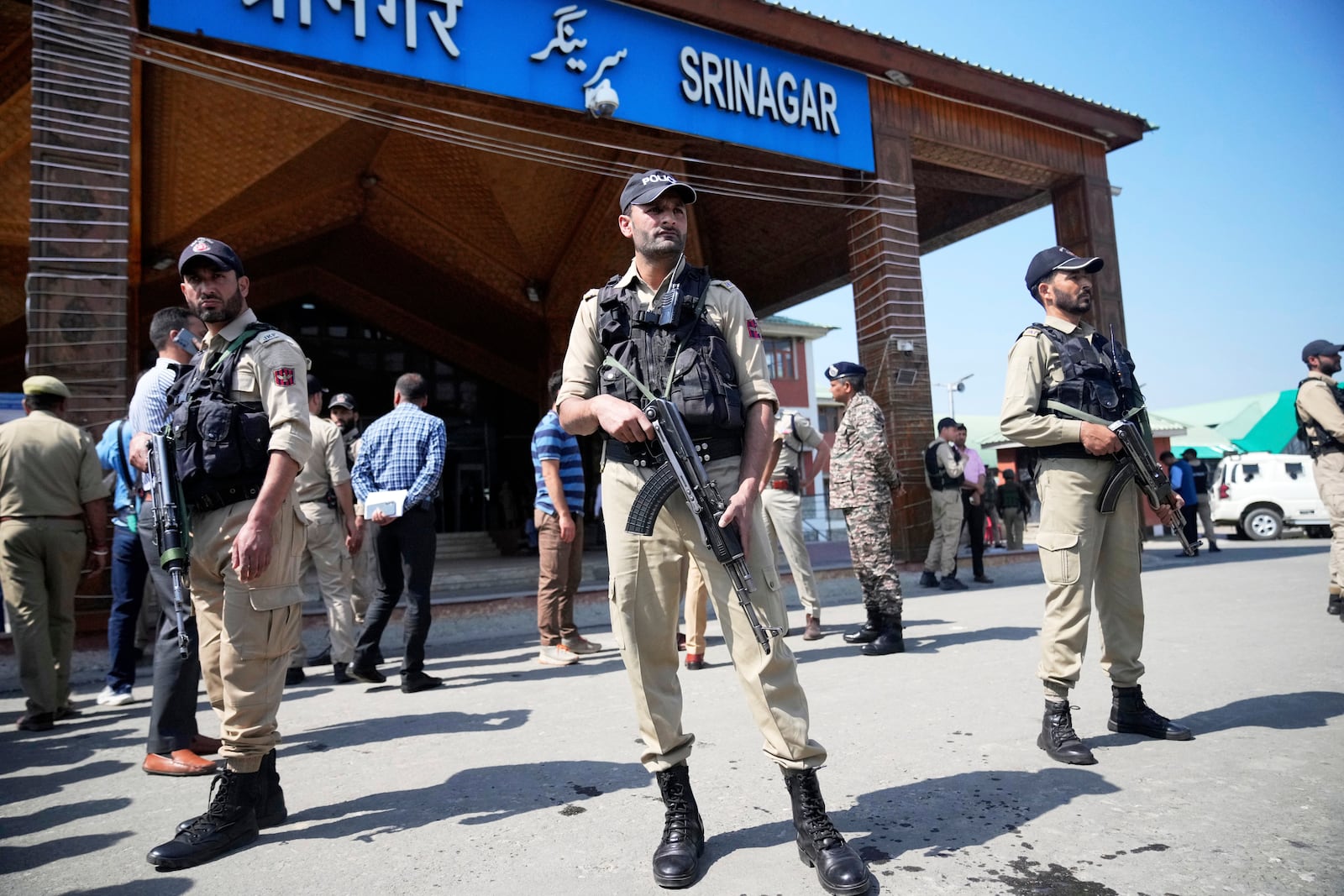 Security personnel stand guard outside the Srinagar railway station, from where Vande Bharat Express train is soon to be inaugurated to run between Srinagar and Katra, in Srinagar, Indian controlled Kashmir, Friday, June 6, 2025. (AP Photo/Dar Yasin)