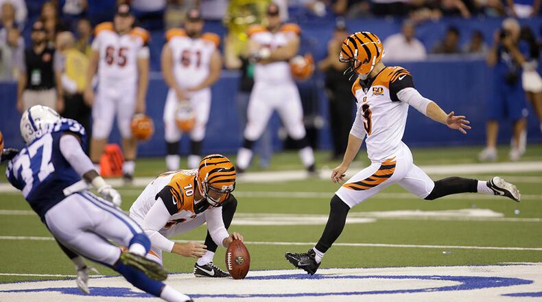 Cincinnati Bengals kicker Jake Elliott (3) misses a field goal from he hold of Kevin Huber in the second half of a preseason NFL football game against the Indianapolis Colts in Indianapolis, Thursday, Aug. 31, 2017. The Colts defeated the Bengals 7-6. (AP Photo/AJ Mast)