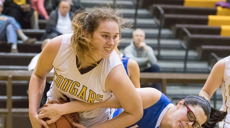 Greeneview’s Jacquie Hall (right) tries to take the ball away from Kenton Ridge’s Mikala Morris during a nonconference game last season. Contributed Photo by Bryant Billing