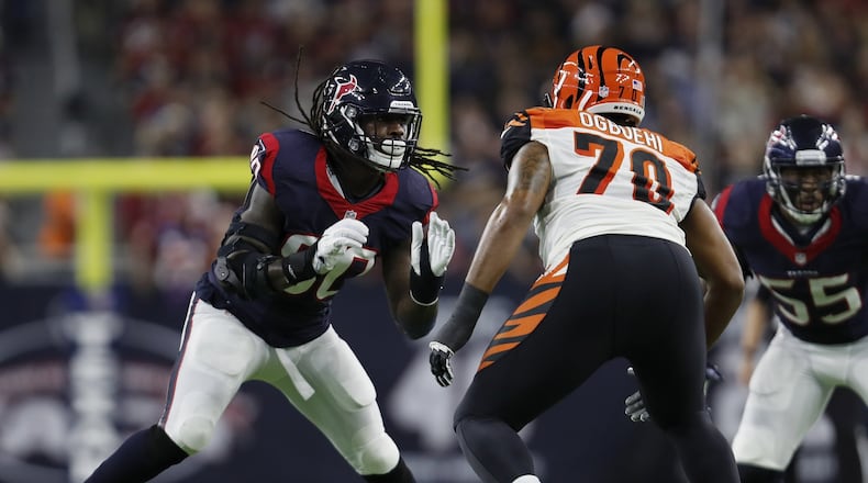 HOUSTON, TX - DECEMBER 24: Jadeveon Clowney #90 of the Houston Texans rushes against Cedric Ogbuehi #70 of the Cincinnati Bengals in the second quarter at NRG Stadium on December 24, 2016 in Houston, Texas. (Photo by Tim Warner/Getty Images)