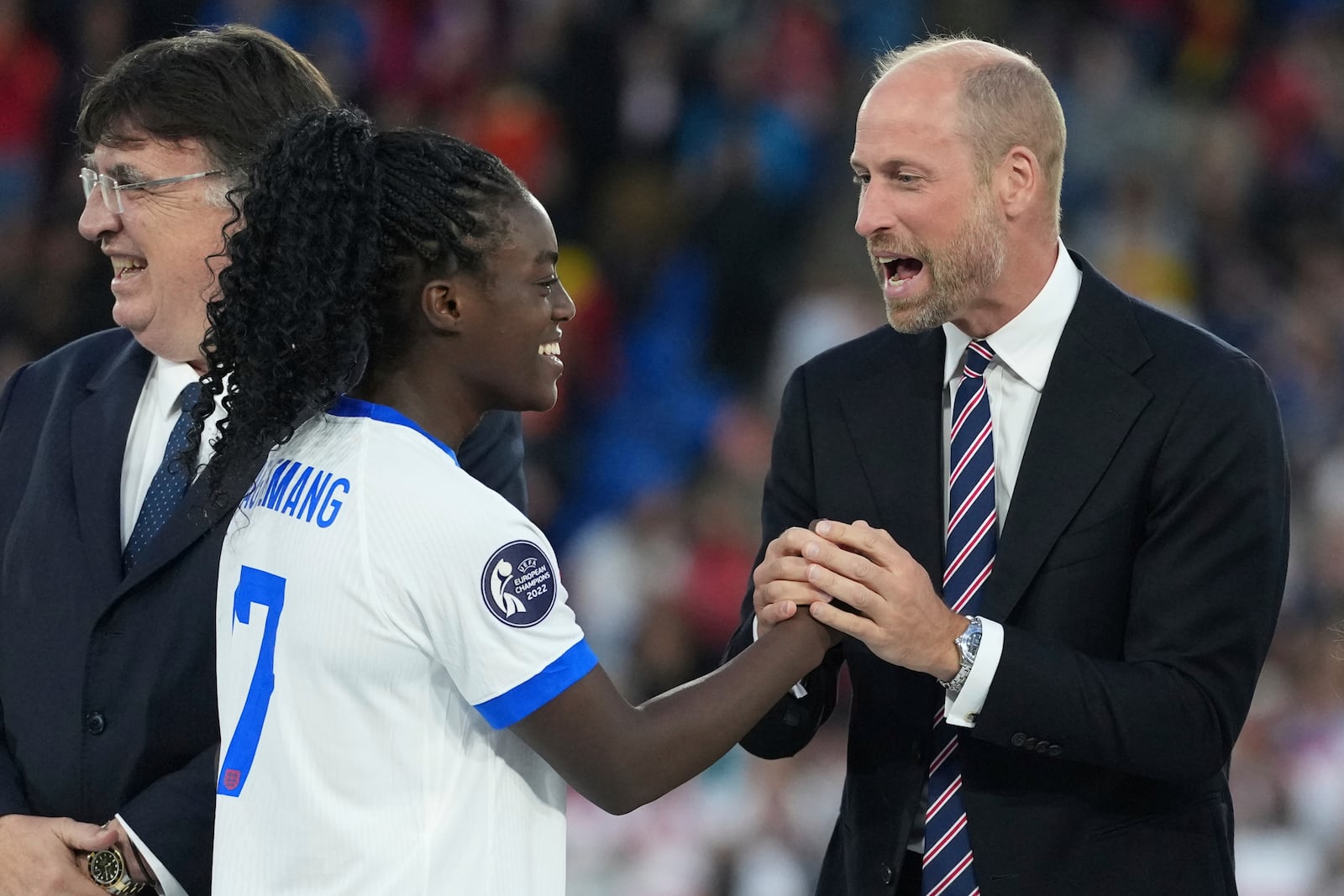 Britain's Prince William congratulates to England's Michelle Agyemang after the Women's Euro 2025 final soccer match between England and Spain at St. Jakob-Park in Basel, Switzerland, Sunday, July 27, 2025. (AP Photo/Martin Meissner)