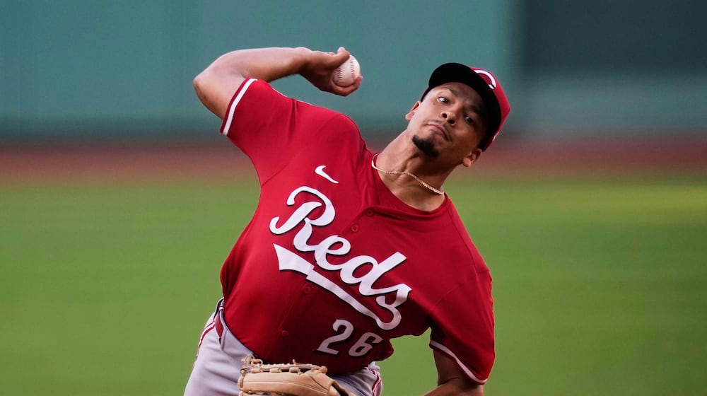 Cincinnati Reds pitcher Chase Burns delivers during the first inning of a baseball game against the Boston Red Sox at Fenway Park, Monday, June 30, 2025, in Boston. (AP Photo/Charles Krupa)