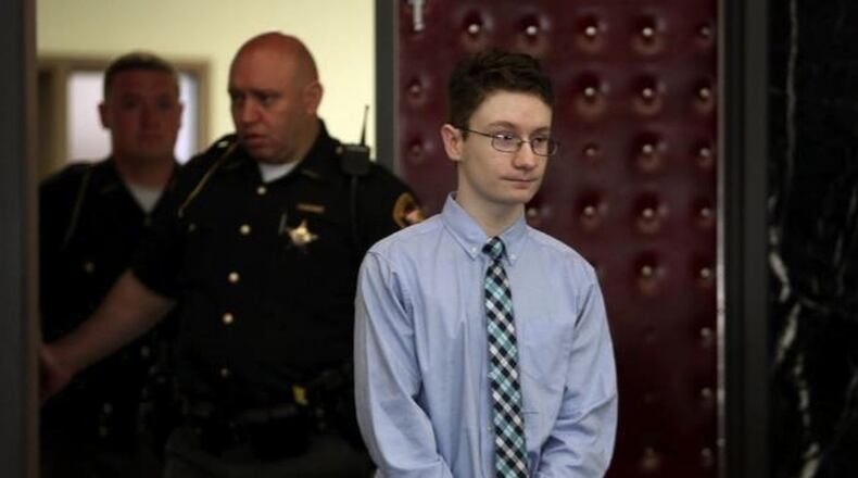 Donovan Nicholas, 16, enters Champaign County Common Pleas Court in Urbana Tuesday, July 24, 2018. He was sentenced to life in prison with no chance of parole for 28 years for the murder of his father s longtime girlfriend, Heidi Fay Taylor. Eric Albrecht/The Columbus Dispatch