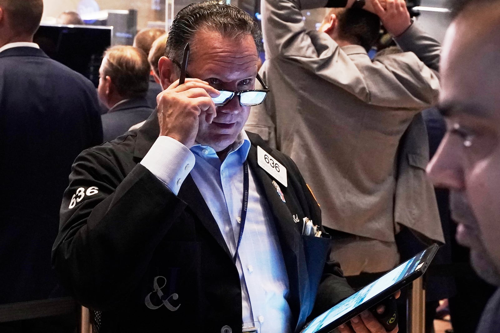 Trader Edward Curran works on the floor of the New York Stock Exchange, Friday, May 2, 2025. (AP Photo/Richard Drew)