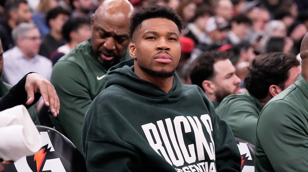 Milwaukee Bucks forward Giannis Antetokounmpo watches teammates during the first half of an NBA basketball game against the Chicago Bulls in Chicago, Sunday, March 1, 2026. (AP Photo/Nam Y. Huh)