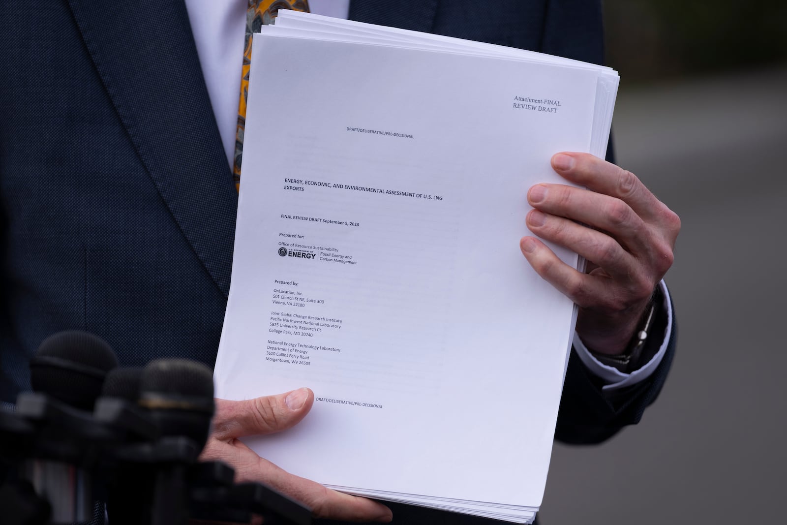 FILEL - Energy Secretary Chris Wright holds a report concerning U.S. exports of liquefied natural gas (LNG) as he speaks to reporters at the White House in Washington, on March 19, 2025. (AP Photo/Ben Curtis, File)