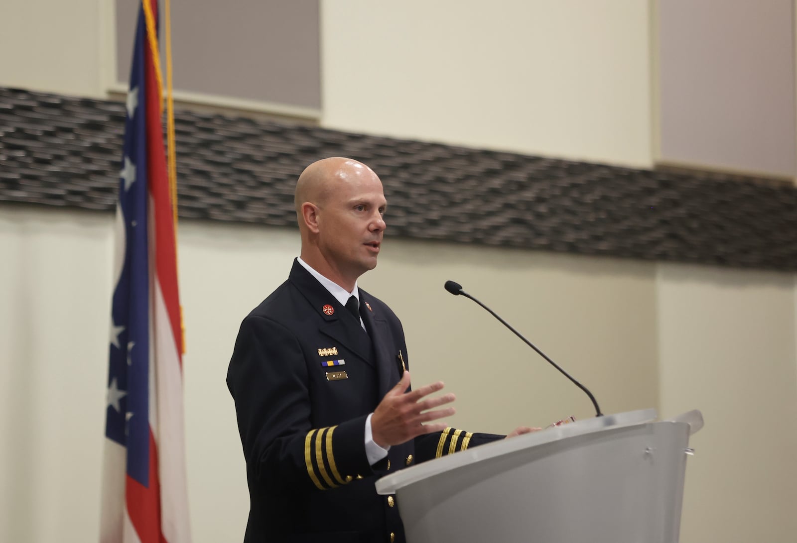 Springfield Fire Rescue Battalion Chief Dan Faust speaks as he's recognized at the Springfield Rotary Club's Service Above Self Awards on Monday, May 19, 2025, at Hollenbeck Bayley Center. JOSEPH COOKE/STAFF