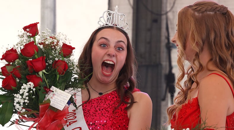 2024 Clark County Fair Queen, Ellen Getz, reacts as she's presented with a crown, sash and flowers after being announced as the winner of this year's queen  contest on the first day of the fair Friday, July 19, 2024. BILL LACKEY/STAFF
