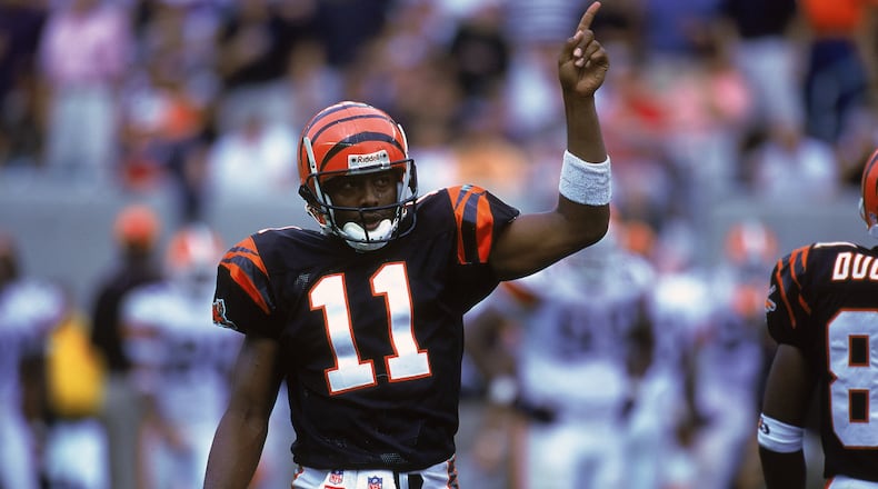 10 Sep 2000: Akili Smith #11 of the Cincinnati Bengals signals from the field during the game against the Cleveland Browns at the Paul Brown Stadium in Cincinnati, Ohio. The Browns defeated the Bengals 24-7.Mandatory Credit: Jonathan Daniel /Allsport