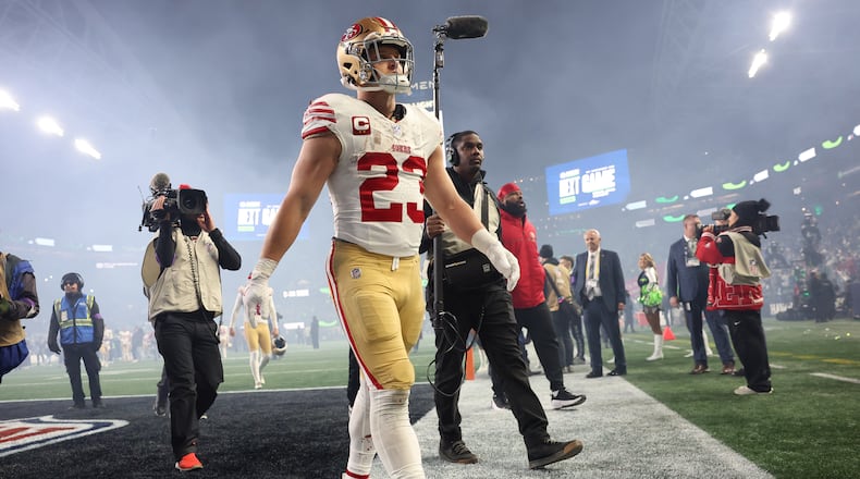 San Francisco 49ers' Christian McCaffrey walks off the field after an NFL football divisional playoff game against the Seattle Seahawks, Saturday, Jan. 17, 2026, in Seattle. (Scott Strazzante/San Francisco Chronicle via AP)