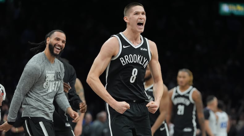 Brooklyn Nets' Egor Demin (8) celebrates after making a three-point shot during the second half of an NBA basketball game against the Orlando Magic Wednesday, Jan. 7, 2026, in New York. (AP Photo/Frank Franklin II)