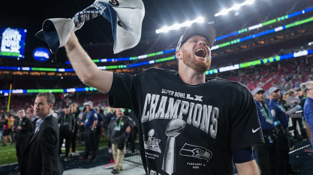 Seattle Seahawks quarterback Sam Darnold celebrates after a win over the New England Patriots in the NFL Super Bowl 60 football game, Sunday, Feb. 8, 2026, in Santa Clara, Calif. (AP Photo/Matt Slocum)