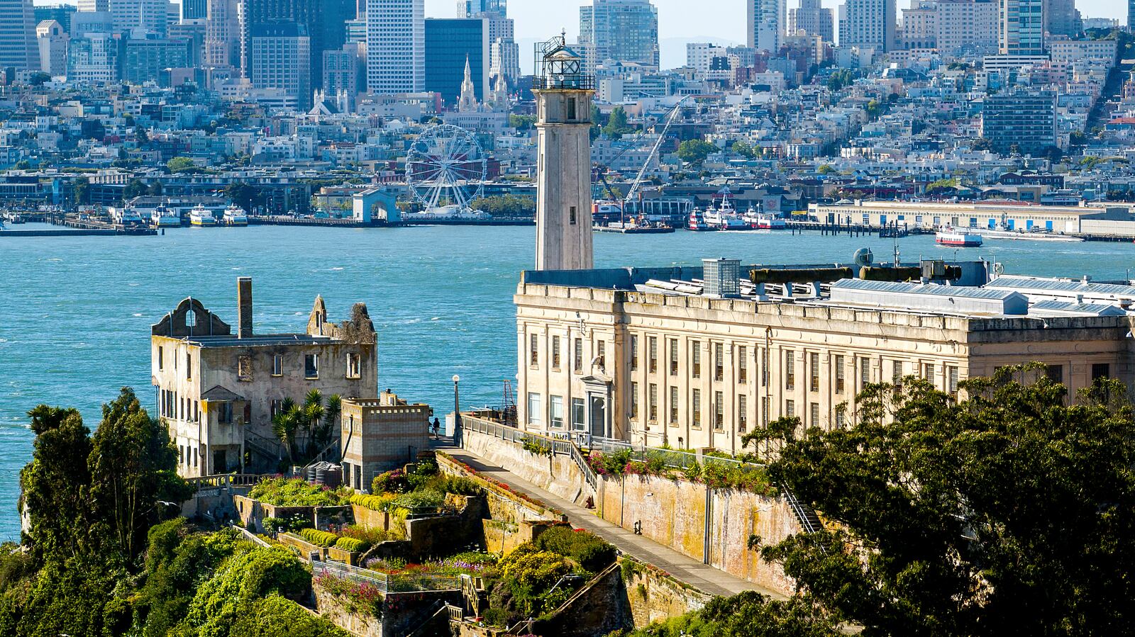 With San Francisco in the background, Alcatraz Island is pictured on Monday, May 5, 2025, in the San Francisco Bay, Calif. (AP Photo/Noah Berger)