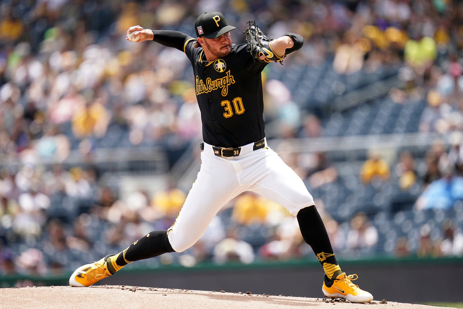 Pittsburgh Pirates pitcher Paul Skenes delivers during the first inning of a baseball game against the Arizona Diamondbacks, Sunday, July 27, 2025, in Pittsburgh. (AP Photo/Matt Freed)