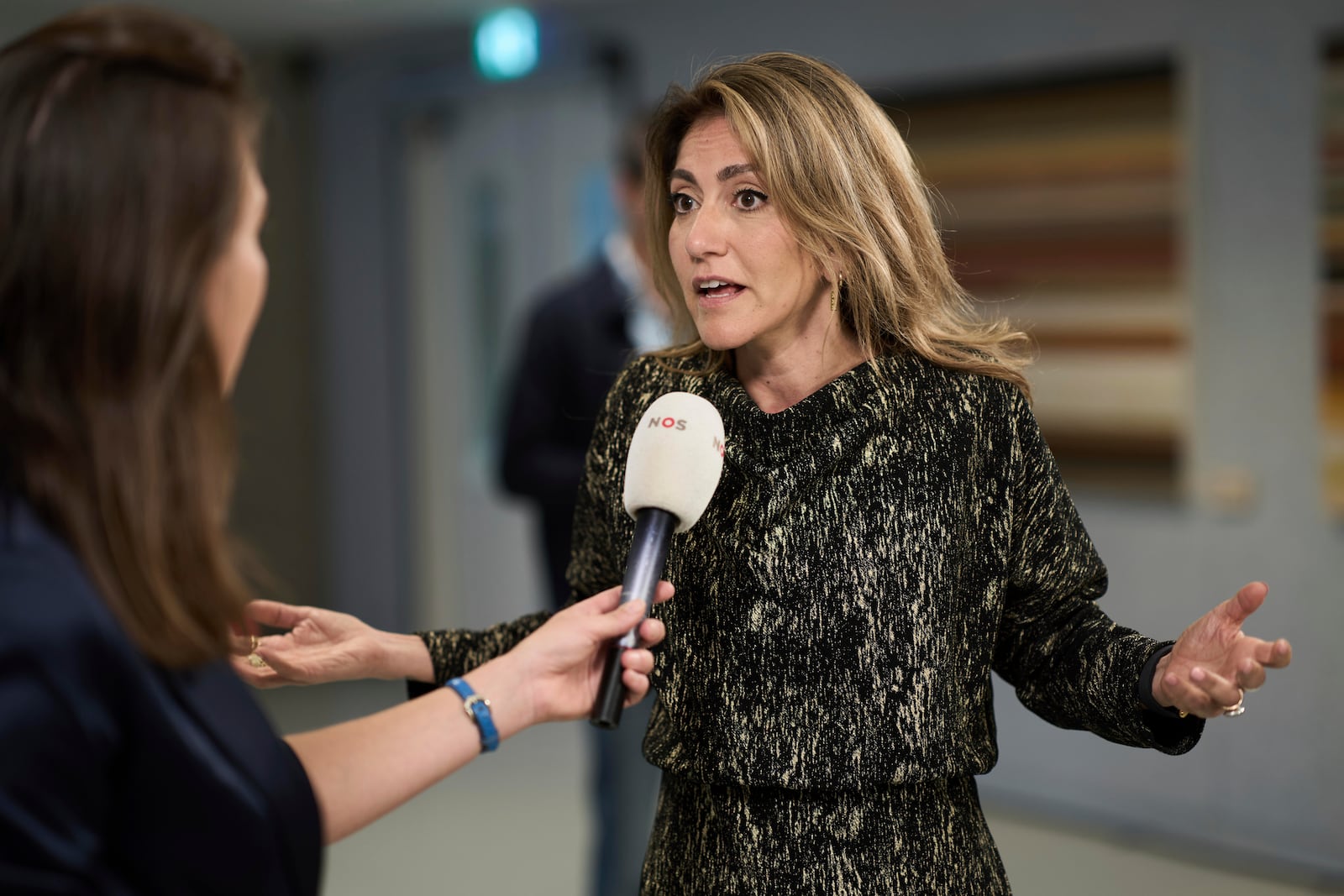 Dilan Yesilgöz, leader of the right-wing People's Party for Freedom and Democracy, speaks to the media after a meeting in The Hague, Netherlands, Tuesday, June 3, 2025, after far-right leader Geert Wilders pulled his party out of the ruling four-party Dutch coalition in dispute over migration. (AP Photo/Peter Dejong)