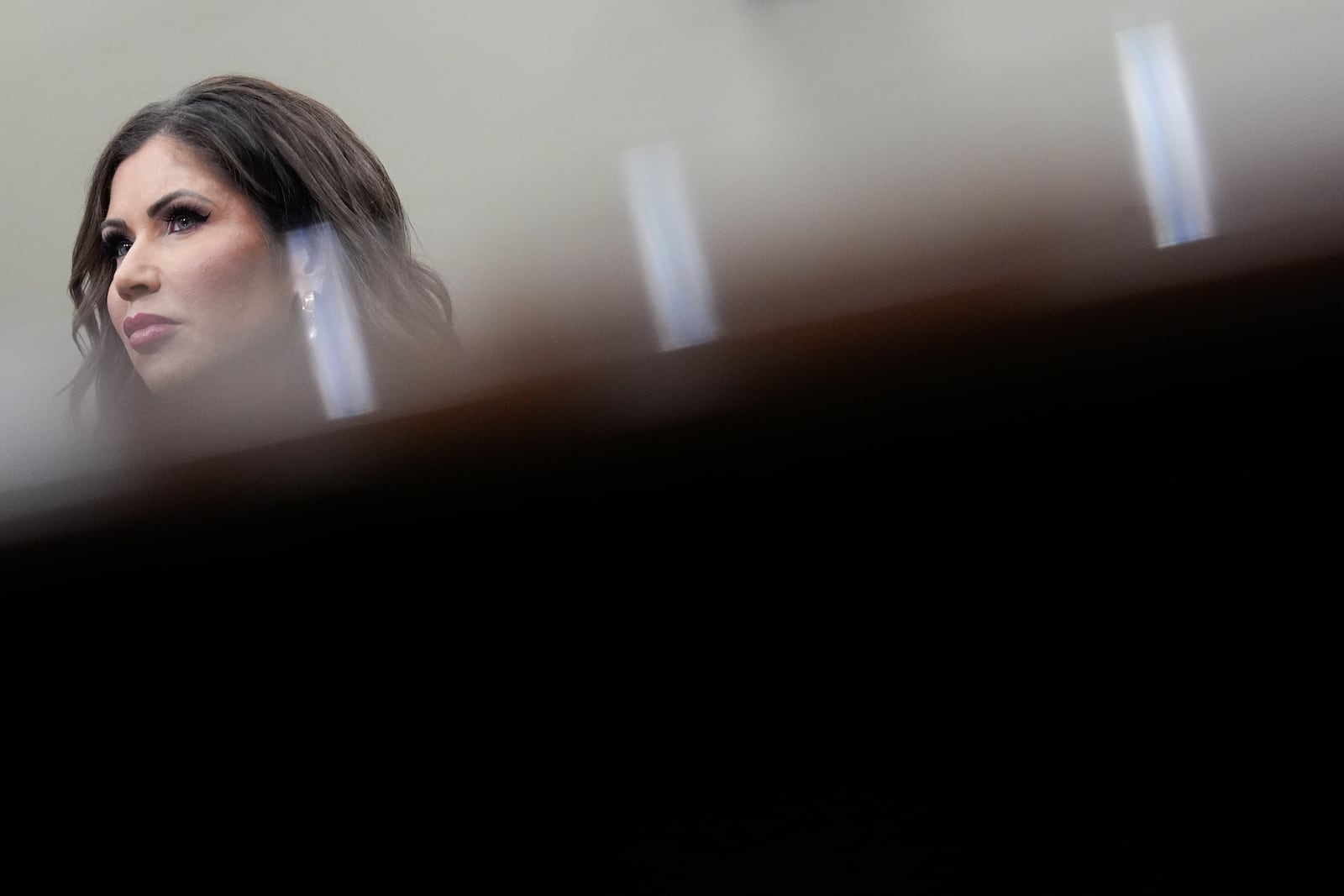 Homeland Security Secretary Kristi Noem listens to members speak during a House Appropriations Subcommittee on Homeland Security oversight hearing, Tuesday, May 6, 2025, on Capitol Hill in Washington. (AP Photo/Julia Demaree Nikhinson)