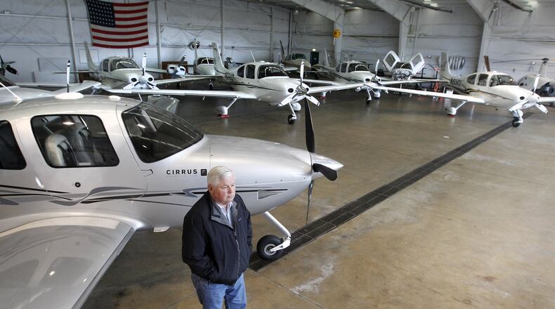 Don Smith, manager of the Lewis A. Jackson Regional Airport in Xenia, stands in one of the hangers. The county regional airport may be expanding and moving toward increasing commercial activity in hopes of boosting revenues. LISA POWELL / STAFF