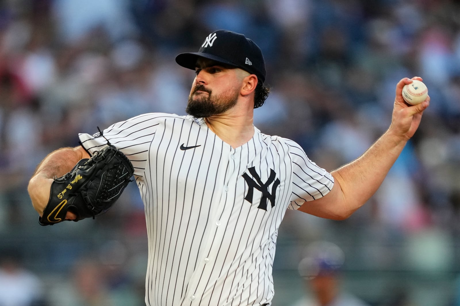 New York Yankees pitcher Carlos Rodón throws during the third inning of a baseball game against the Chicago Cubs, Friday, July 11, 2025, in New York. (AP Photo/Yuki Iwamura)