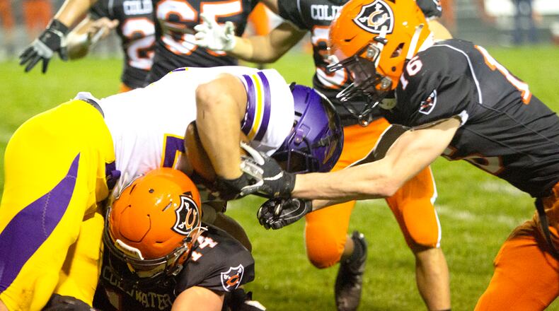 Mechanicsburg running back Chase Propst looks for running room during the first of Saturday night's Division VI, Region 24 final at Coldwater. Jeff Gilbert/CONTRIBUTED