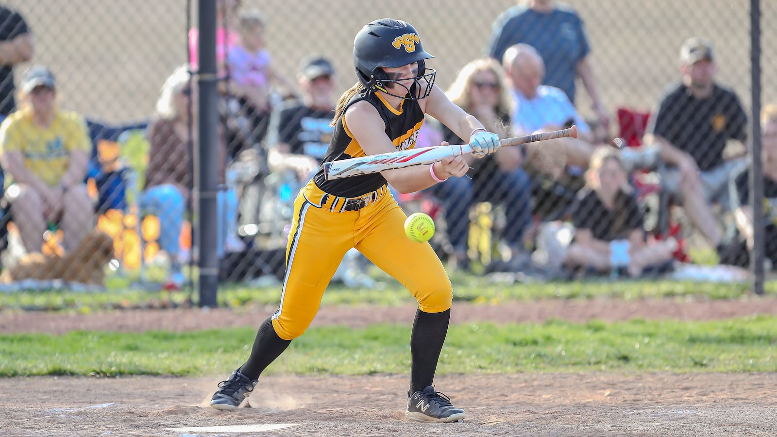 Shawnee High School freshman Byanca Dubie lays down a bunt during their game against Benjamin Logan on April 23 in Springfield. MICHAEL COOPER / STAFF