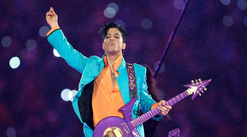 FILE - Prince performs during the halftime show at the Super Bowl XLI football game in Miami, Feb. 4, 2007. Prince, who died in 2016, starred in the film "Purple Rain." (AP Photo/Chris O'Meara, File)