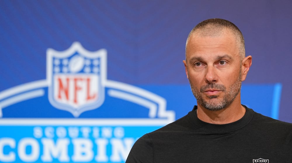 Las Vegas Raiders general manager John Spytek speaks during a press conference at the NFL football scouting combine in Indianapolis, Tuesday, Feb. 24, 2026. (AP Photo/Michael Conroy)