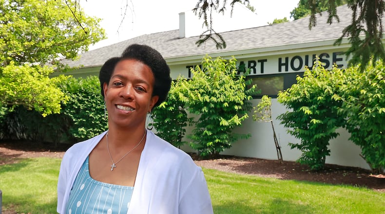 In this 2023 file photo, Wendy Doolittle, the CEO of McKinley Hall, poses in front of the future site of the Mental Health Urgent Care and Transitional Facility along East High Street. BILL LACKEY/FILE