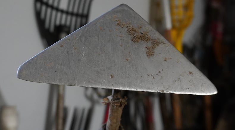 A triangle hoe cuts weeds from all sides. CONTRIBUTED