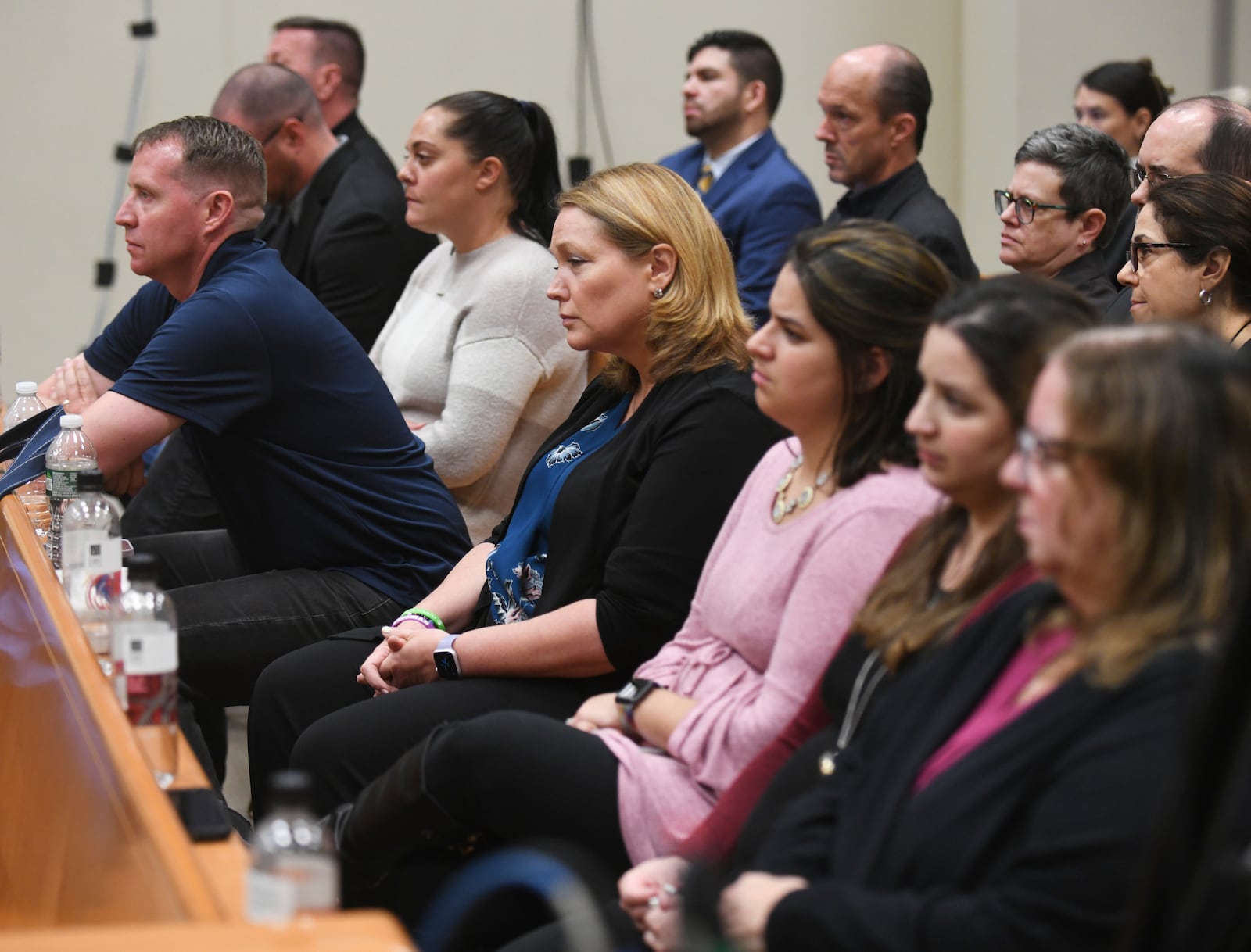 FILE - Families of Sandy Hook victims sit in the front row as Infowars founder Alex Jones testifies during the Sandy Hook defamation damages trial at Connecticut Superior Court in Waterbury, Conn. Thursday, Sept. 22, 2022. (Tyler Sizemore/Hearst Connecticut Media via AP, Pool, File)