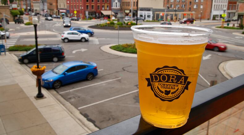 The Designated Outdoor Refreshment Area or DORA in downtown Urbana has expanded. BILL LACKEY/STAFF
