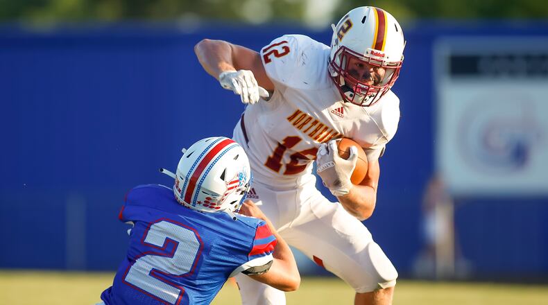 Northeastern High School senior Gunnar Leonard runs with the ball after catching a pass during their game earlier this season against Greeneview. CONTRIBUTED PHOTO BY MICHAEL COOPER