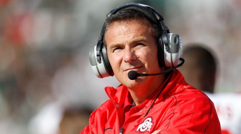 EAST LANSING, MI - SEPTEMBER 29: Head coach Urban Meyer of the Ohio State Buckeyes looks on while playing the Michigan State Spartans at Spartan Stadium on September 29, 2012 in East Lansing, Michigan. (Photo by Gregory Shamus/Getty Images)