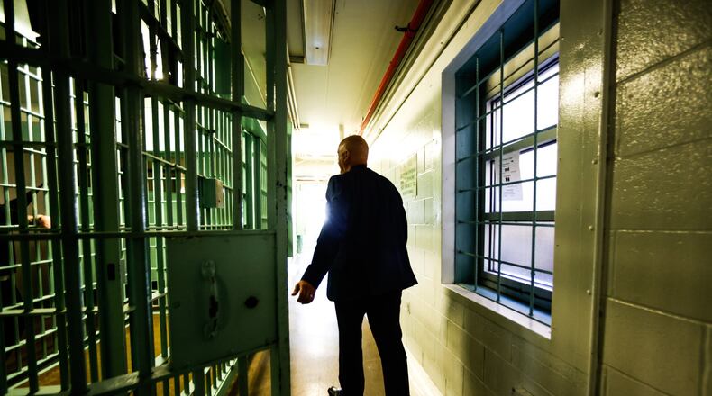 Greene County Police Major Kirk Keller walks through the third story of the Greene County Jail. The jail was built in the 1960s and Keller hopes Greene County residence will pass a sales tax to replace the aging building. JIM NOELKER/STAFF