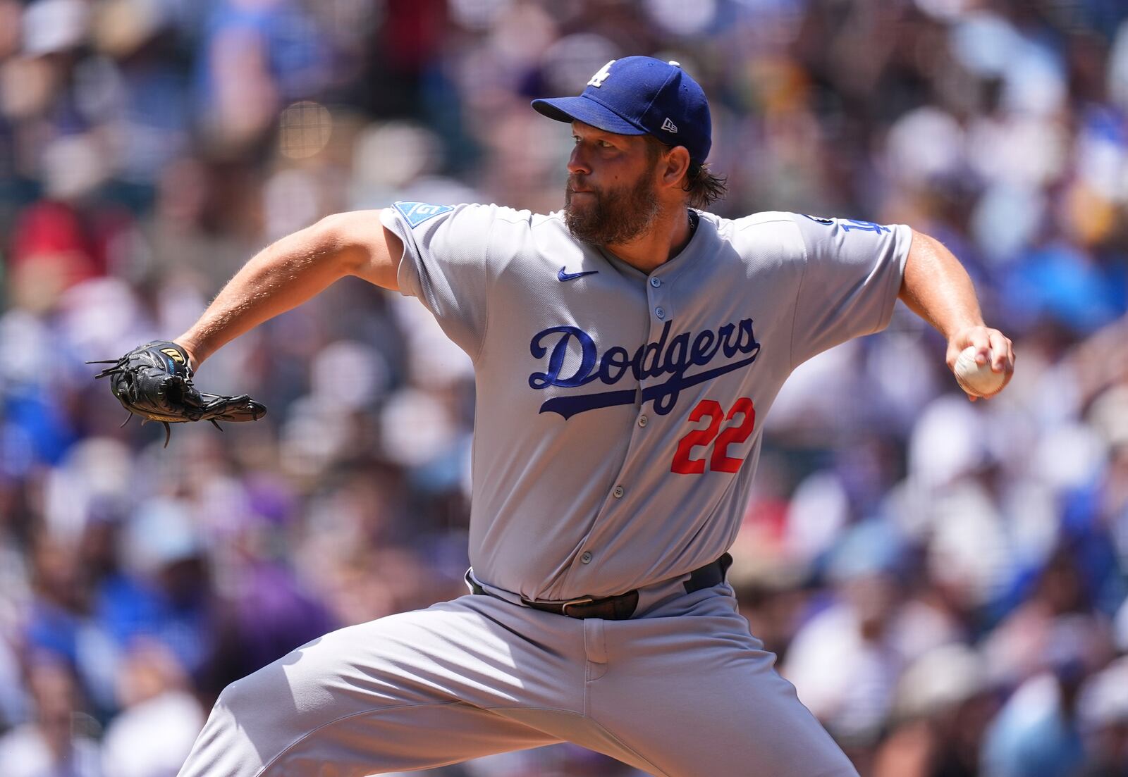 Los Angeles Dodgers starting pitcher Clayton Kershaw works against the Colorado Rockies in the first inning of a baseball game Thursday, June 26, 2025, in Denver. (AP Photo/David Zalubowski)