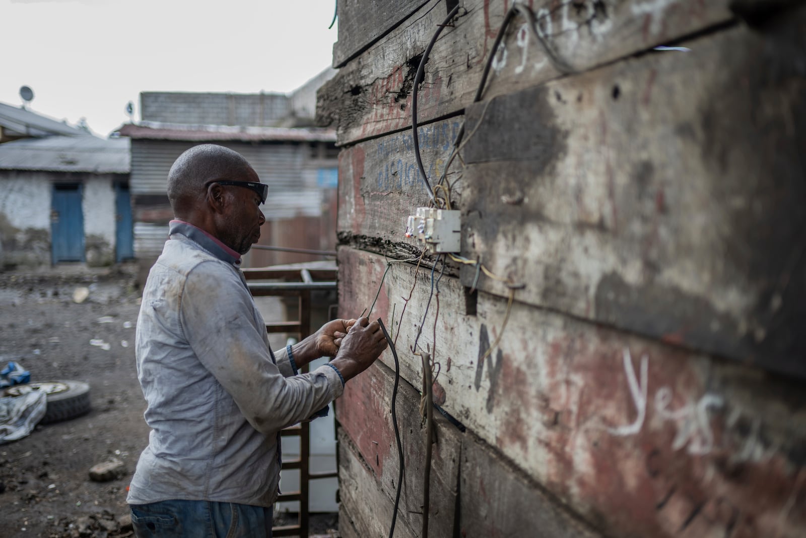 Mahamudu Bitego, a welder, works at his business in Goma, Congo, May 23, 2025 (AP Photo/Moses Sawasawa)