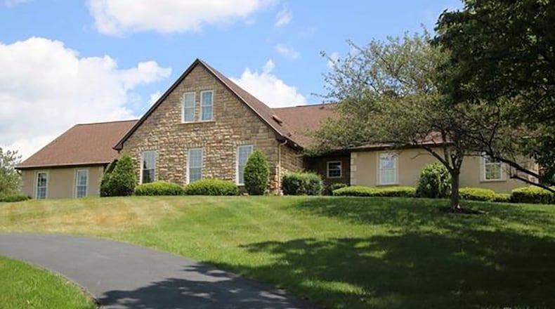 The one-and-a-half-story home features about 3,010 sq. ft. of living space. There are 4 bedrooms, 3 full and one-half baths and a partially finished basement with a recreation room. CONTRIBUTED PHOTO