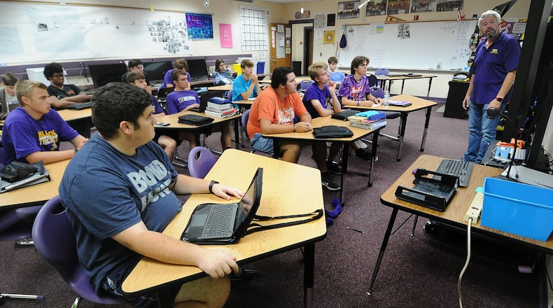 Bellbrook High School students take AP computer science class in March 2022 with teacher Rob Schultz. FILE