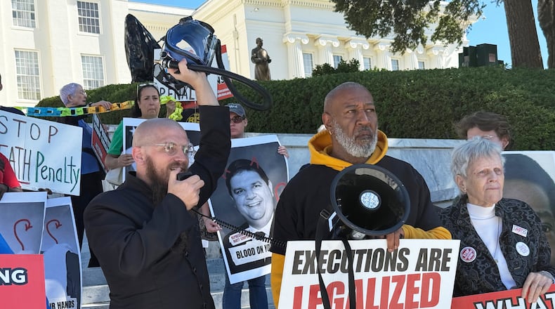 The Rev. Jeff Hood speaks at a protest against the death penalty on Wednesday, Oct. 22, 2025, at the Alabama Capitol in Montgomery, Ala. (AP Photo/Kim Chandler)